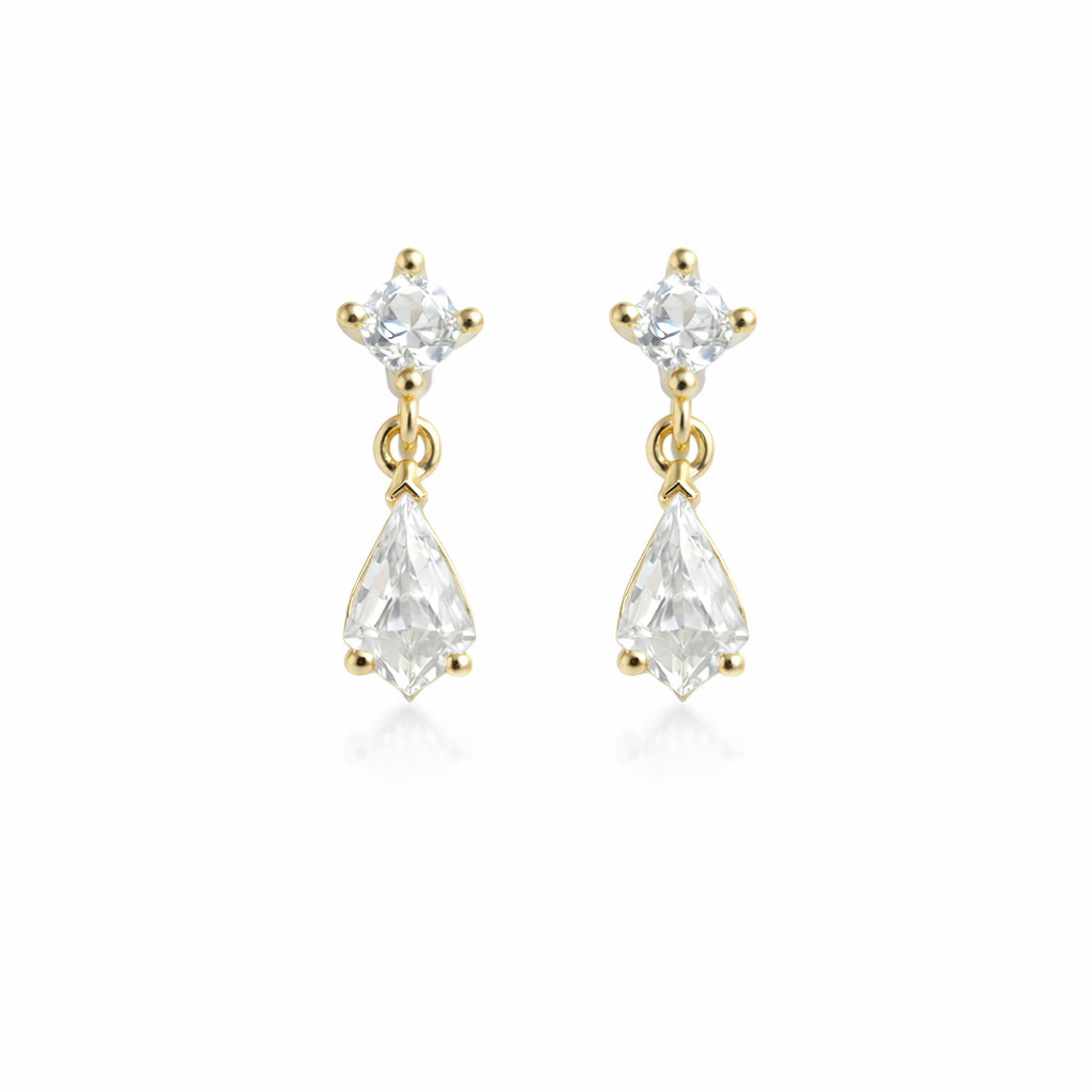 Gold earrings with clear teardrop-shaped gemstones on a white background