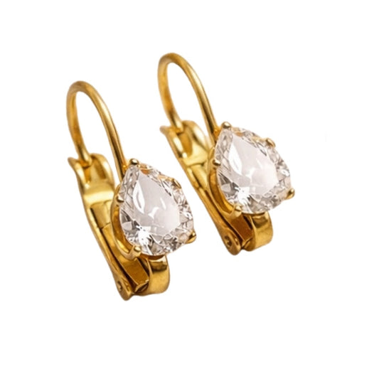 Gold hoop earrings with clear gemstones on a white background