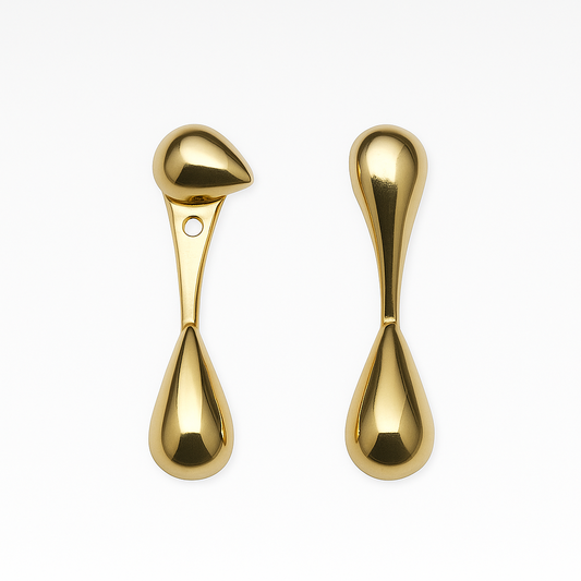 Pair of gold earrings on a white background